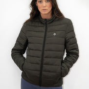 Woman wearing a dark green puffer jacket with a logo on a white background