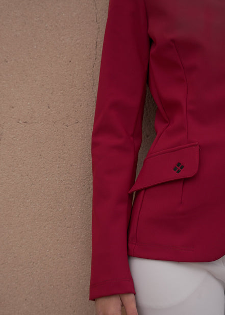 Red jacket with a textured beige background